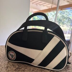 The Gola x Anthropologie Bowler Bag is a sporty design with a floral Gola emblem